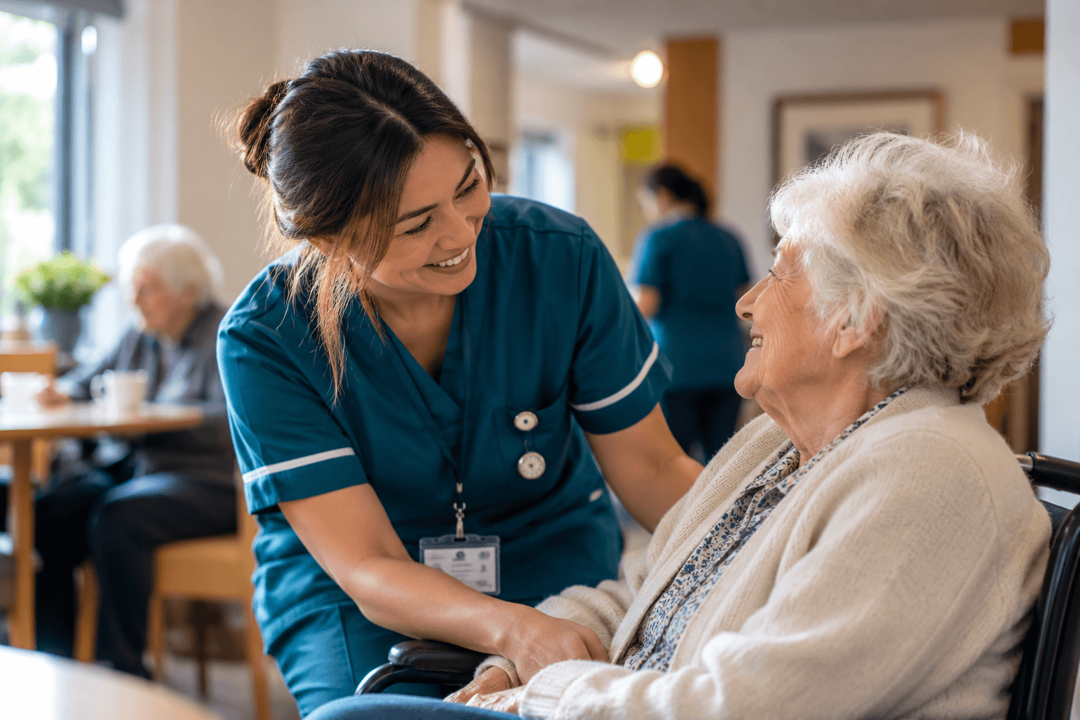 Healthcare professionals sharing a supportive moment in a care setting